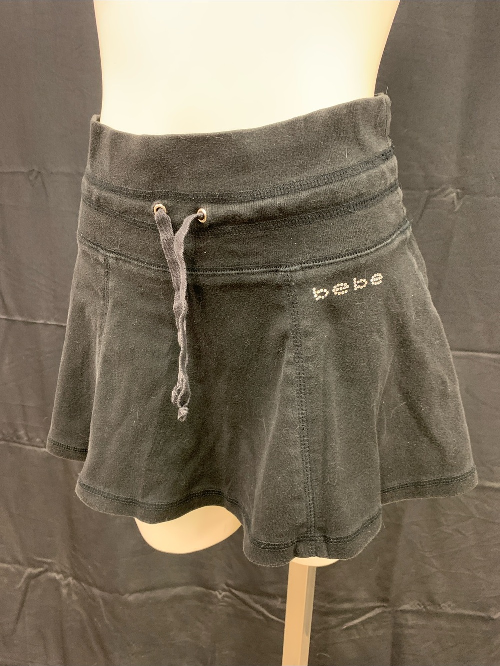 Bebe Black Mini Skirt with drawstring waist size small